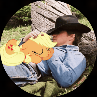 A Man In A Cowboy Hat Is Laying In The Grass With A Cartoon Pony Sleeping On His Chest GIF