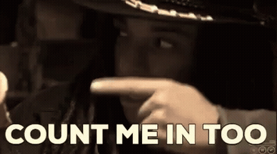 A Man In A Cowboy Hat Is Pointing At The Camera With The Words Count Me In Too Behind Him GIF