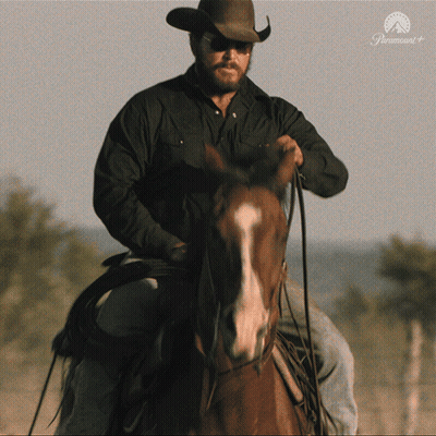 A Man In A Cowboy Hat Is Riding A Horse With A Paramount Logo On The Bottom GIF