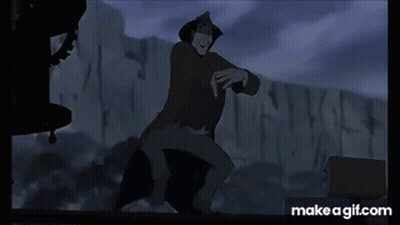 A Man In A Cowboy Hat Is Standing In Front Of A Wall With A Gun In His Hand . GIF