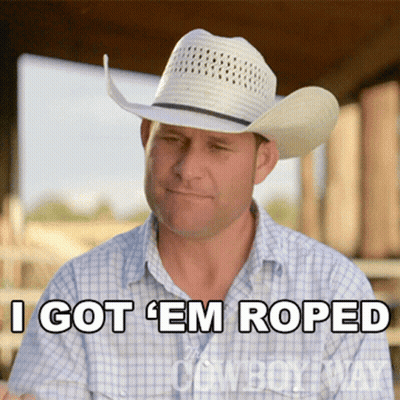 A Man In A Cowboy Hat Says " I Got 'Em Roped " GIF
