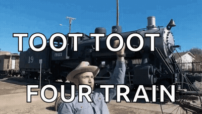 A Man In A Cowboy Hat Stands In Front Of A Train With The Words Toot Toot Four Train Written Above Him GIF