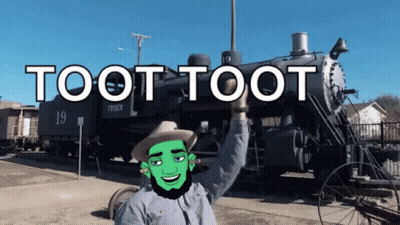 A Man In A Cowboy Hat Stands In Front Of A Train With The Words Toot Toot On It GIF