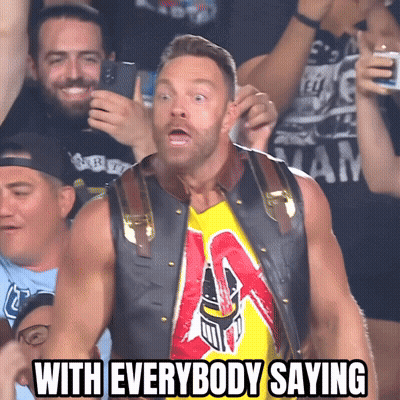 A Man In A Crowd With The Words With Everybody Saying GIF