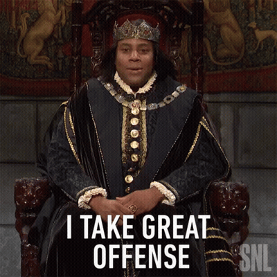 A Man In A Crown Is Sitting In A Chair And Says I Take Great Offense GIF