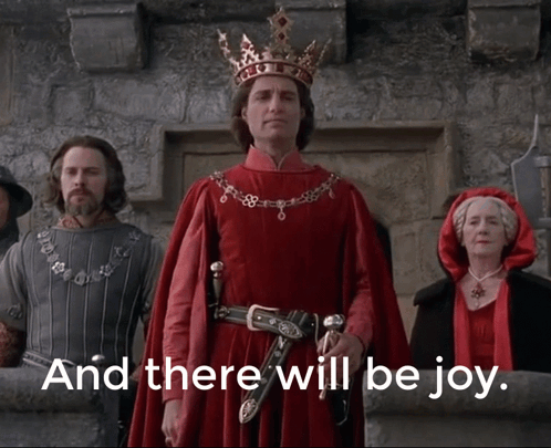 A Man In A Crown Stands In Front Of A Group Of People With The Words And There Will Be Joy Written Below Him GIF