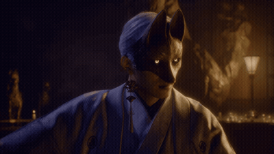 A Man In A Dark Room Holding A Bat GIF