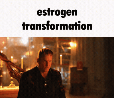 A Man In A Dark Room With The Words Estrogen Transformation Written Above Him GIF