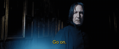 A Man In A Dark Room With The Words Go On Above Him GIF