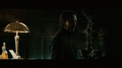 A Man In A Dark Room With The Words " Not If I See You First " On The Screen GIF