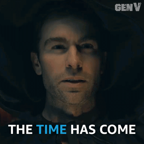 A Man In A Dark Room With The Words The Time Has Come GIF
