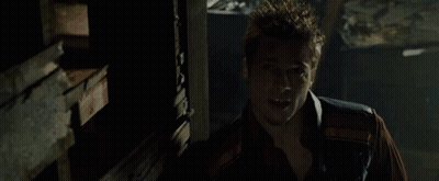 A Man In A Dark Room With The Words " This Conversation " Above Him GIF