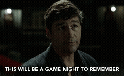A Man In A Dark Room With The Words This Will Be A Game Night To Remember GIF