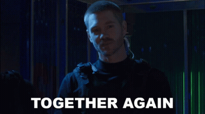 A Man In A Dark Room With The Words Together Again Behind Him GIF