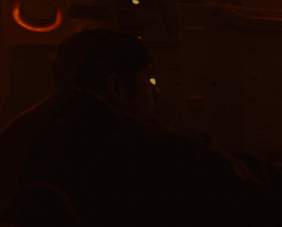 A Man In A Dark Room With The Words " Yo Hop On League " On The Bottom GIF