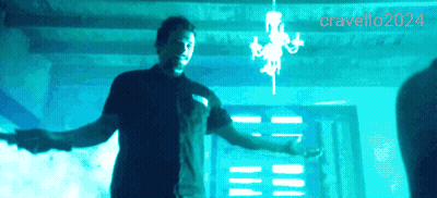 A Man In A Dark Room With The Year 2024 On The Bottom Left GIF