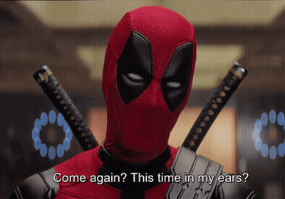 A Man In A Deadpool Costume Is Asking Come Again This Time In My Ears GIF