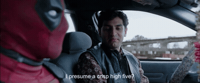 A Man In A Deadpool Costume Is Sitting In A Car GIF