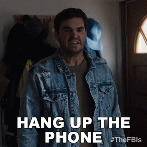 A Man In A Denim Jacket Is Saying " Hang Up The Phone " GIF