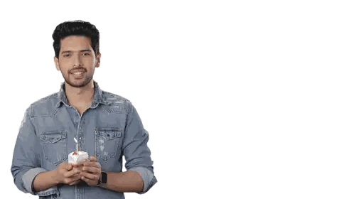 A Man In A Denim Shirt Is Holding A Cupcake With A Lit Candle And Says Happy Birthday Sticker