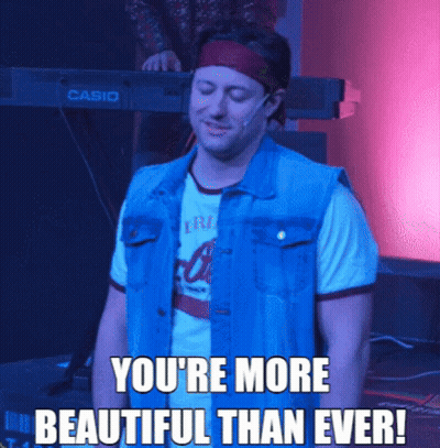 A Man In A Denim Vest Is Standing In Front Of A Casio Keyboard GIF