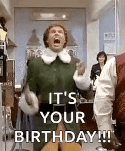 A Man In A Elf Costume Is Screaming And Holding A Guitar In A Room . GIF