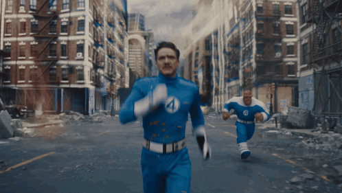 A Man In A Fantastic Four Costume Is Running Down The Street GIF