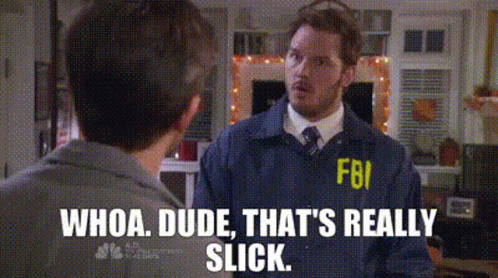 A Man In A Fbi Uniform Talking To Another Man . GIF