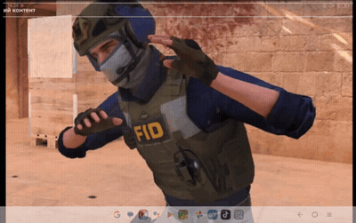 A Man In A Fid Vest Stands In Front Of A Wall GIF