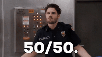 A Man In A Fireman 'S Uniform Is Standing In Front Of A Control Panel That Says 50/50 GIF