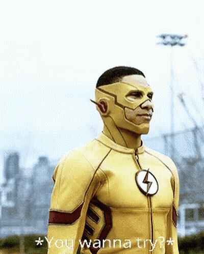 A Man In A Flash Costume Is Standing In Front Of A City Skyline And Says " You Wanna Try " GIF