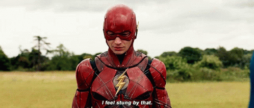 A Man In A Flash Costume Says I Feel Stung By That . GIF