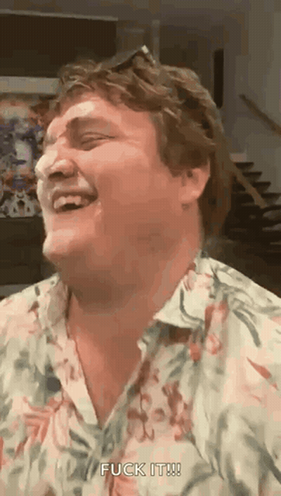 A Man In A Floral Shirt Is Laughing And Saying " Fuck It " . GIF