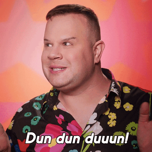 A Man In A Floral Shirt Says Dun Dun Duuun GIF