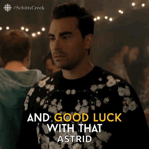 A Man In A Floral Shirt Says Good Luck With That Astrid GIF