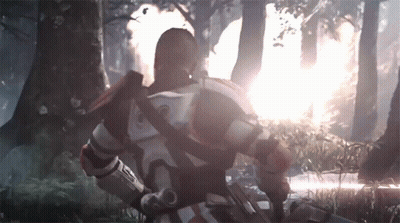 A Man In A Futuristic Armor With The Letter S On His Chest GIF