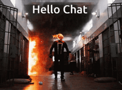 A Man In A Ghost Rider Costume Is Standing In A Hallway With The Words Hello Chat Written Above Him GIF