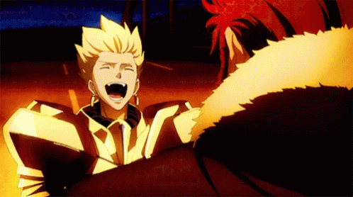 A Man In A Gold Armor Is Laughing Next To Another Man GIF
