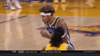 A Man In A Golden State Warriors Jersey Is Kneeling Down GIF