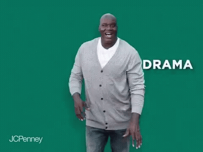 A Man In A Gray Cardigan Is Dancing In Front Of A Green Background With The Word Anxiety . GIF