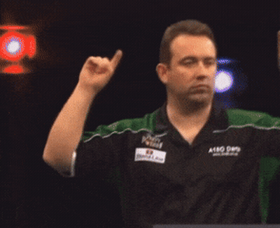 A Man In A Green And Black Shirt With The Word Astro On The Front GIF