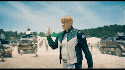 A Man In A Green And White Jacket With The Letter O On The Front GIF