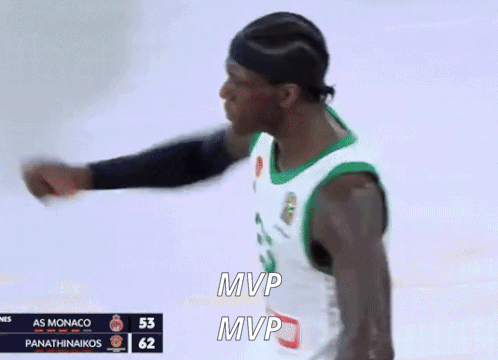 A Man In A Green And White Jersey With The Number 25 On It GIF