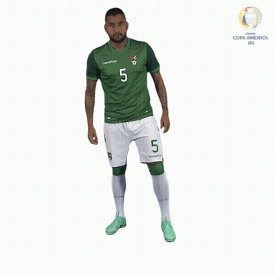 A Man In A Green And White Marathon Jersey With The Number 5 On It GIF