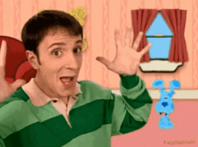 A Man In A Green And White Striped Shirt Is Standing In Front Of A Window With A Blue Dog In The Background . GIF
