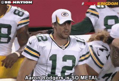 A Man In A Green Bay Packers Jersey Is Talking About Aaron Rodgers GIF