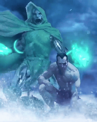 A Man In A Green Cape Is Kneeling Down Next To A Man In A Green Cape GIF