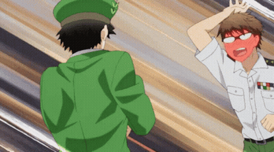 A Man In A Green Hat Is Standing Next To A Man In A White Uniform GIF