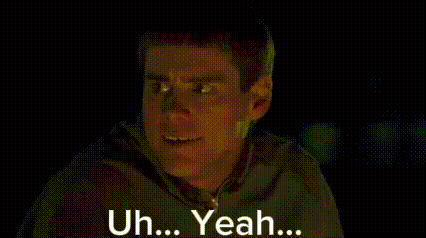 A Man In A Green Hoodie Is Making A Funny Face And Saying Yeah . GIF