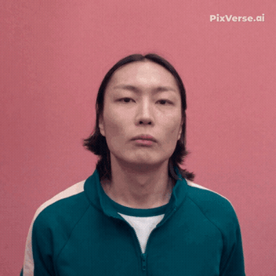 A Man In A Green Jacket Is Smiling In Front Of A Pink Background With Pixverse.ai Written On It GIF